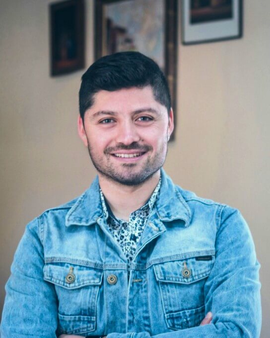 a man wearing a jean jacket