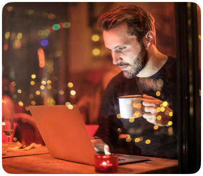 City professional using a mobile phone at night